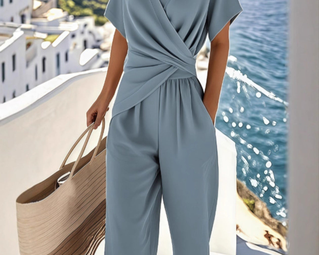 NEWYORKLISTED STYLE COLLECTION: Person wearing a light blue jumpsuit with a scenic background of water and buildings.