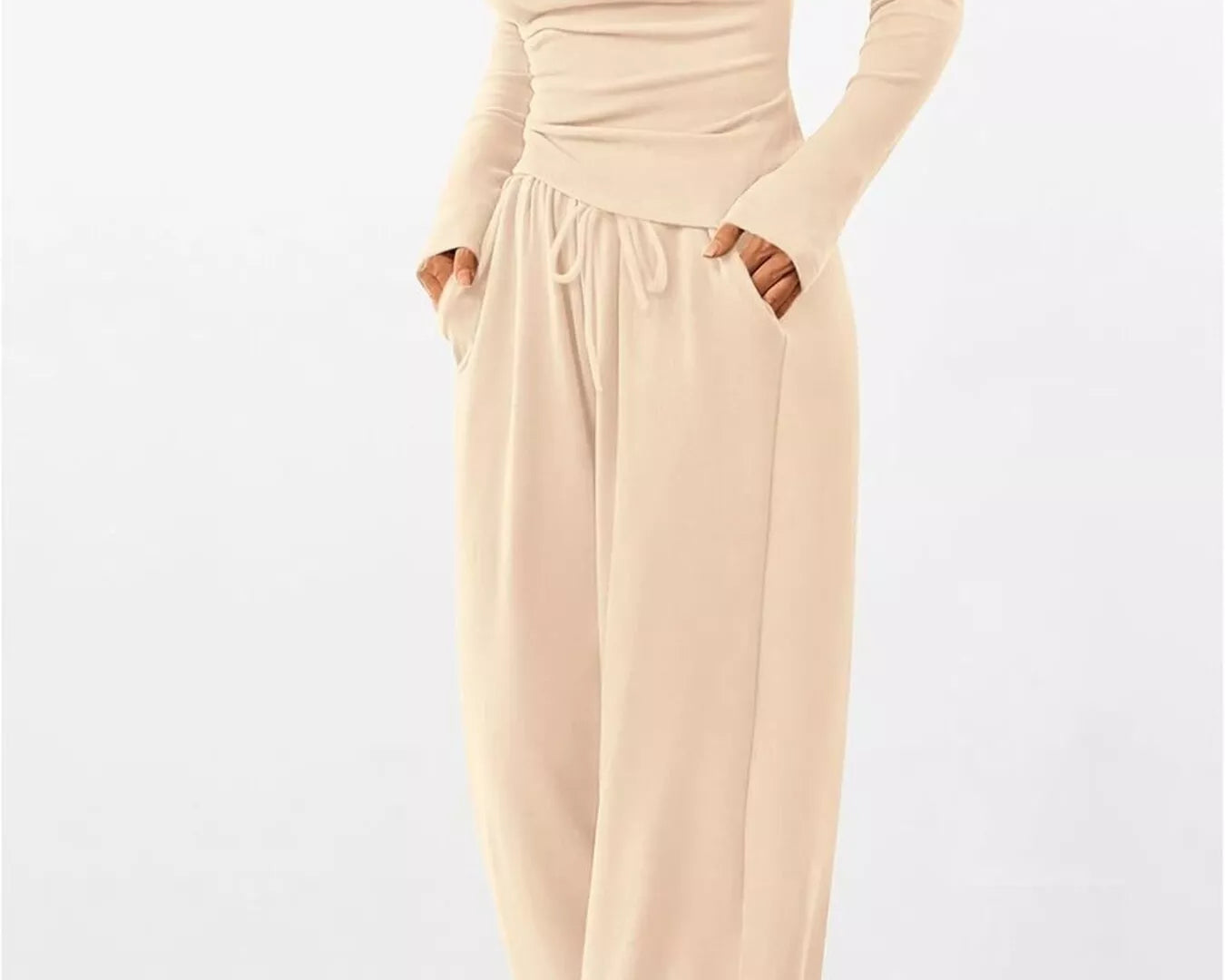 Beige long-sleeve dress on a white background