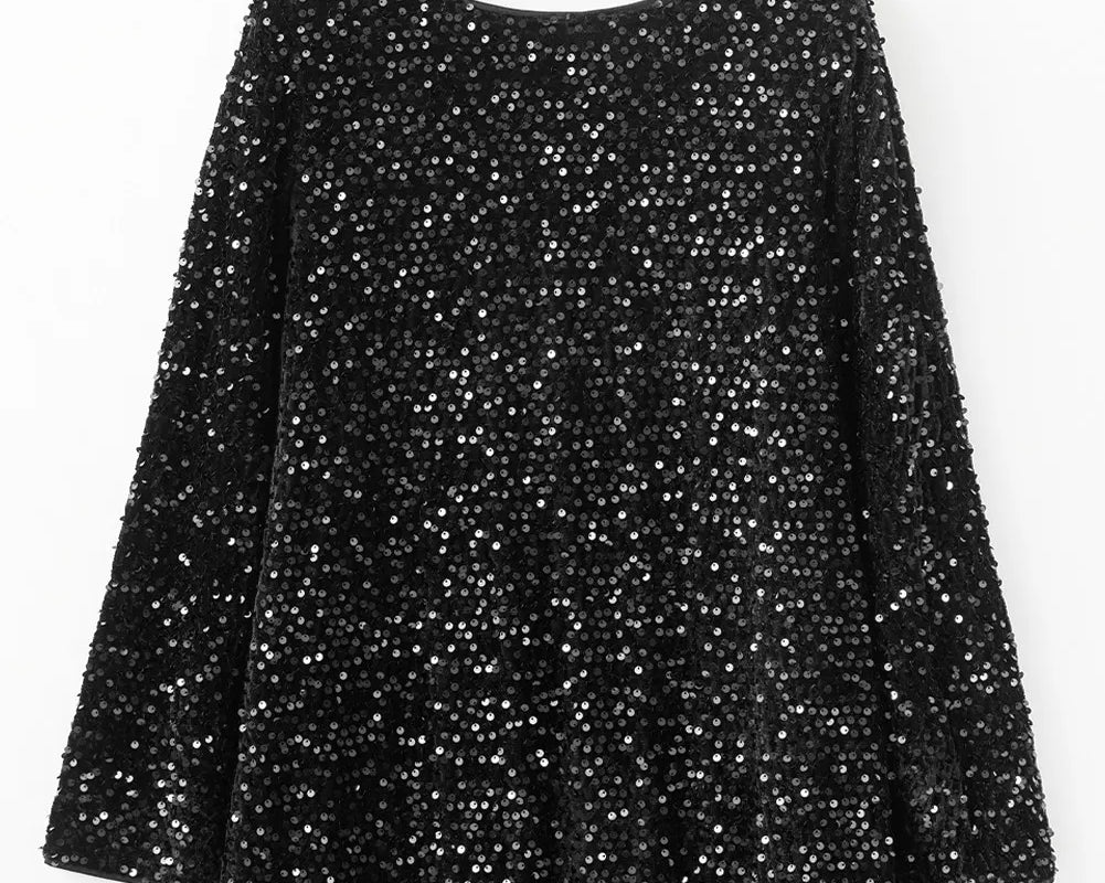 NEWYORKLISTED Valentine's Day Specials: Black sequin dress on a wooden hanger against a white background