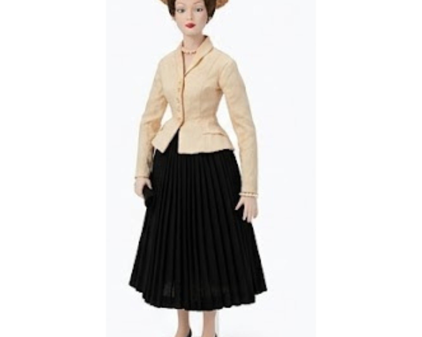 NEWYORKLISTED Unique Finds Collection: Rare 1987 Christian Dior doll in iconic 1947 Bar Suit with vintage straw hat