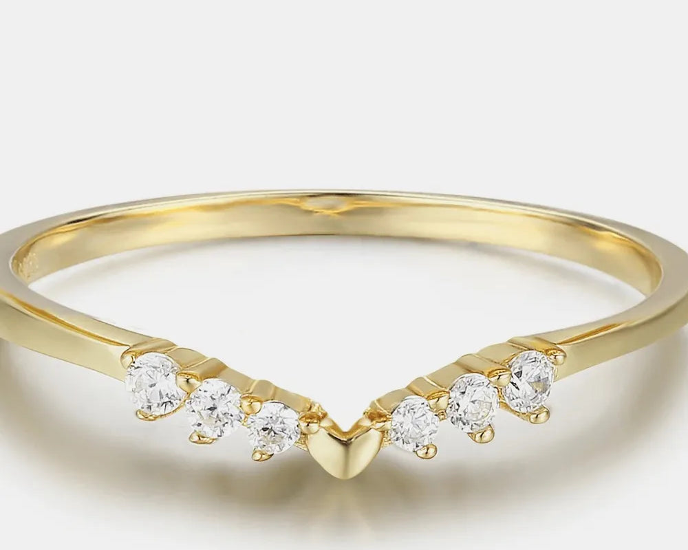 NEWYORKLISTED Valentine's Day Specials: Gold ring with small diamonds on a light background