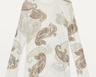 White long-sleeve shirt with brown paisley pattern on a white background