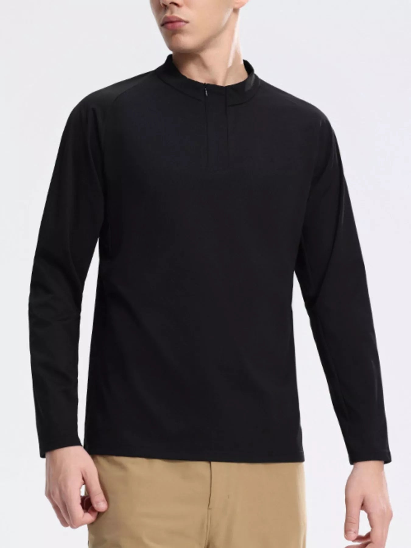 NEWYORKLISTED ATLAS MEN's COLLECTION: Person wearing a black long-sleeve shirt on a white background