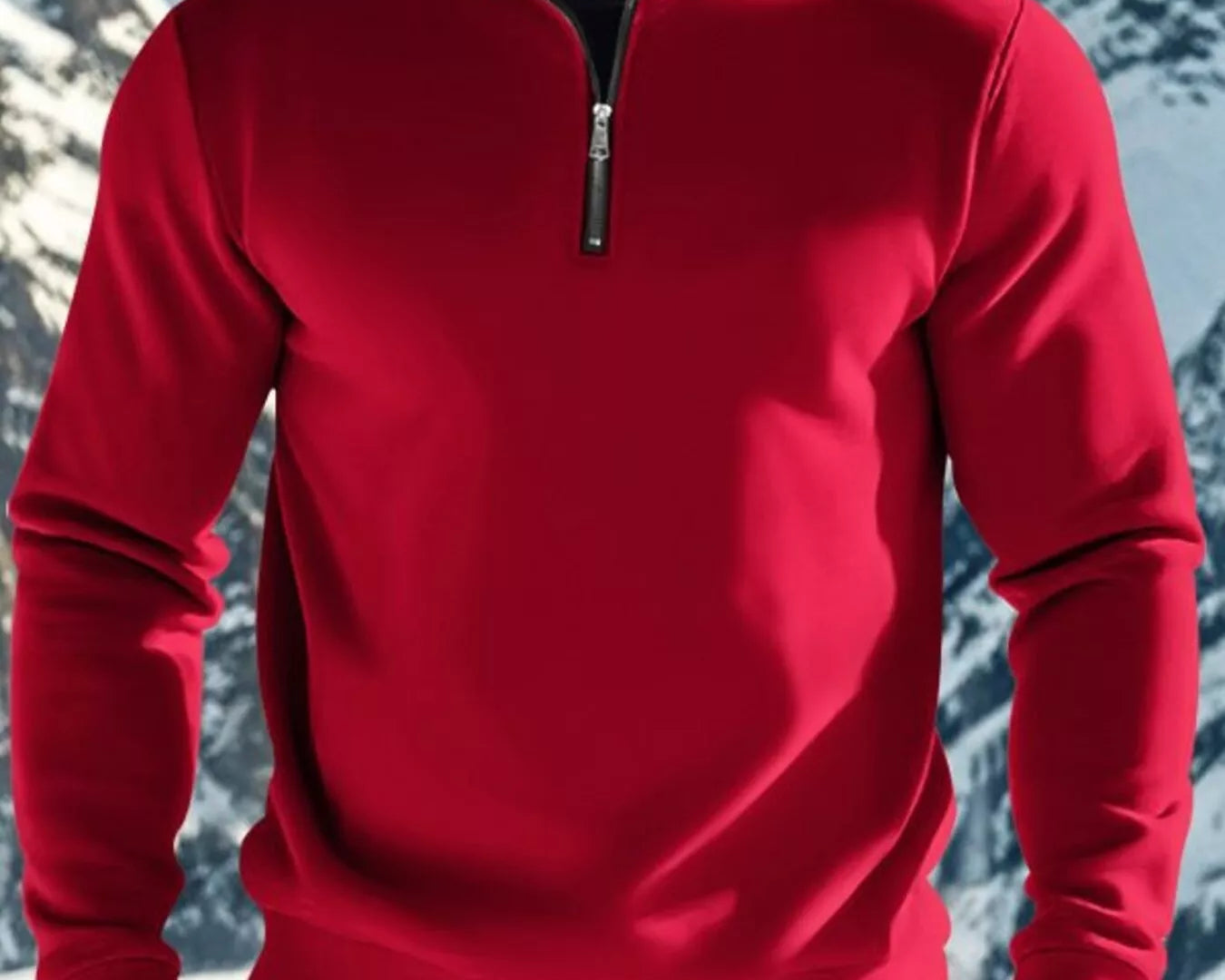NEWYORKLISTED ATLAS MEN'S COLLECTION: Man wearing a red pullover with a mountainous background