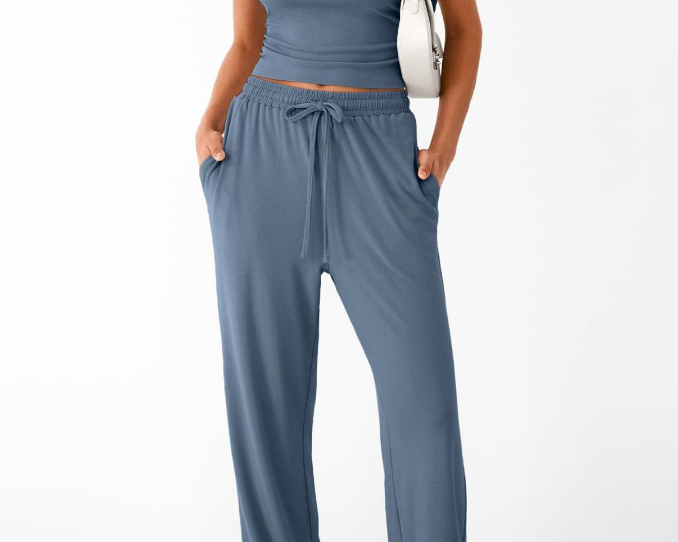 NEWYORKLISTED COMFORT COLLECTION: Woman wearing a blue outfit with a white background
