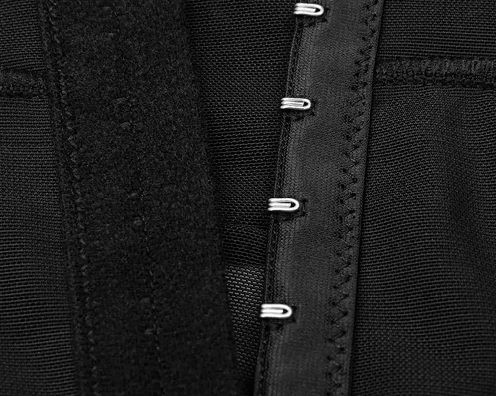 NEWYORKLISTED Intimate Apparel: Close-up of a black garment with button details