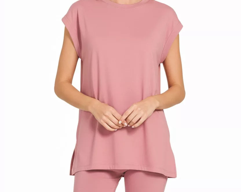 NEWYORKLISTED Comfort Collection: Woman wearing a pink outfit on a white background