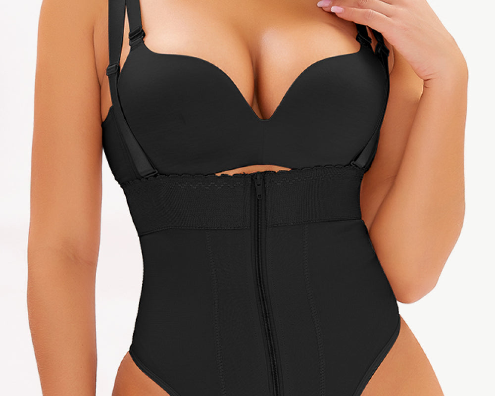 NEWYORKLISTED Intimate Apparel: Black swimsuit worn by a model on a white background