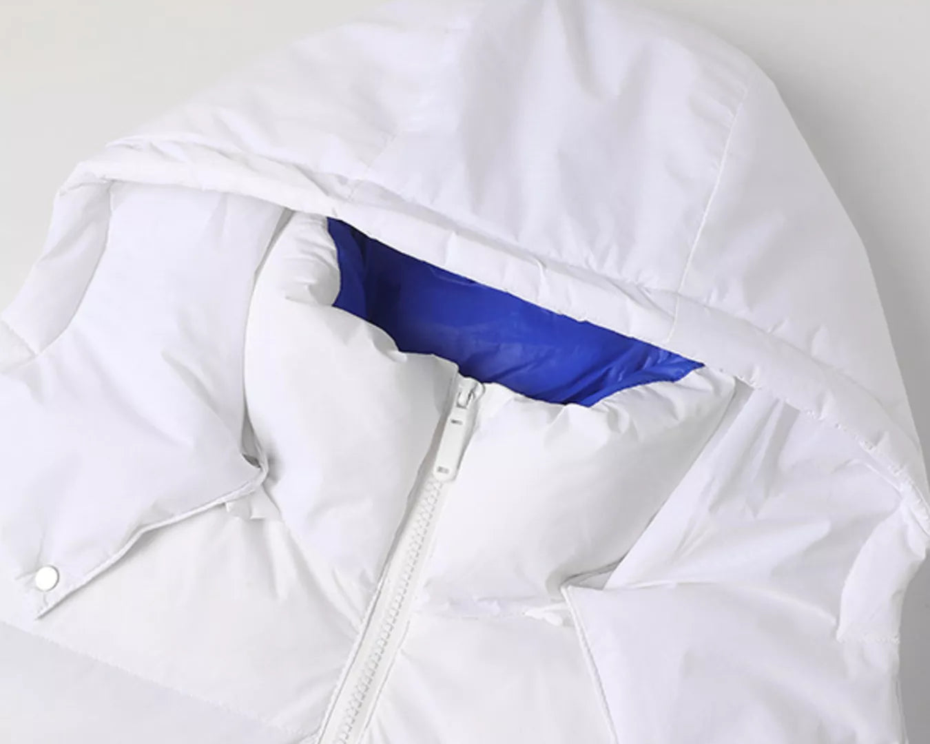 NEWYORKLISTED ATLAS MEN’S COLLECTION: White jacket with blue lining on a white background
