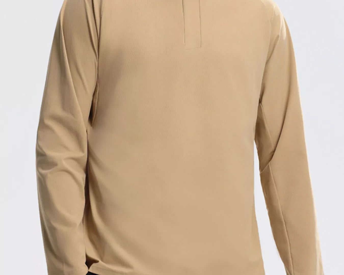 NEWYORKLISTED ATLAS MEN's COLLECTION: Person wearing a beige long-sleeve shirt against a white background