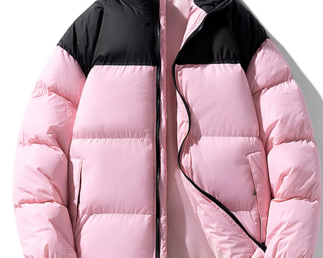 NEWYORKLISTED ATLAS MEN’S COLLECTION: Pink and black puffer jacket on a white background