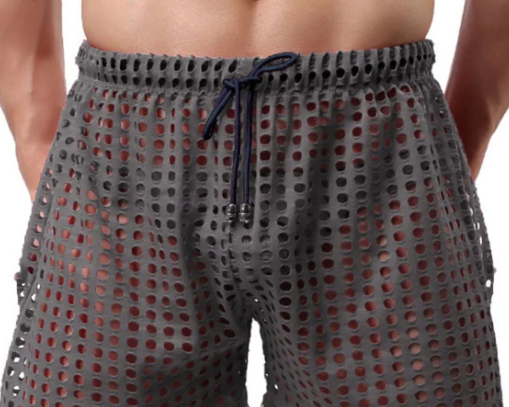 NEWYORKLISTED ATLAS MEN'S COLLECTION: Gray mesh shorts worn by a person on a white background
