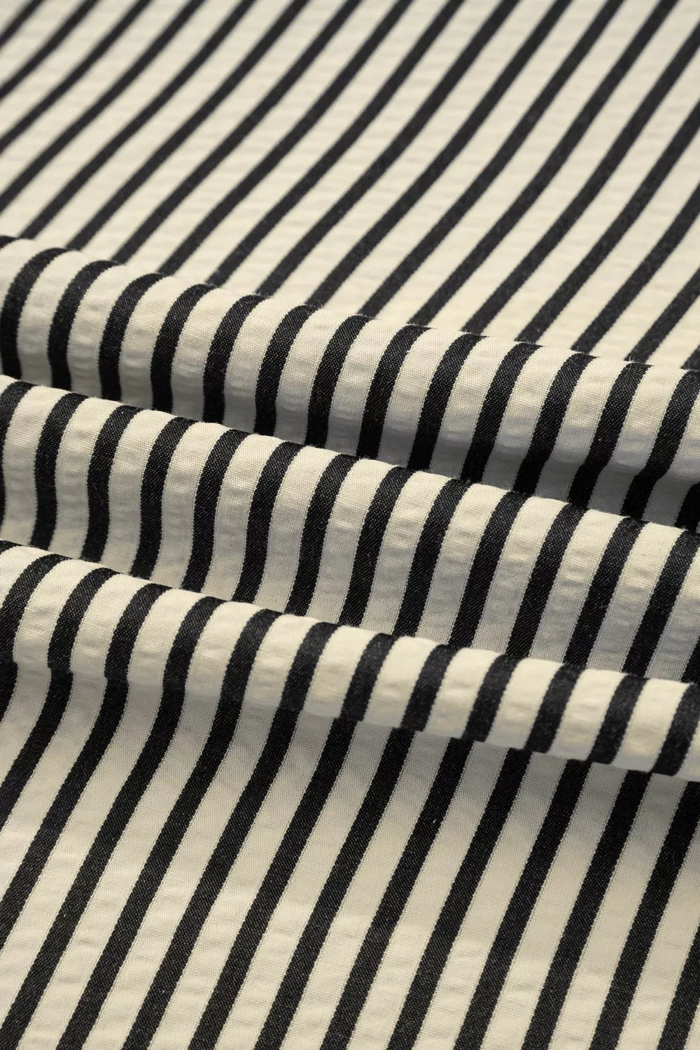 NEWYORKLISTED STYLE COLLECTION: Close-up of black and white striped fabric