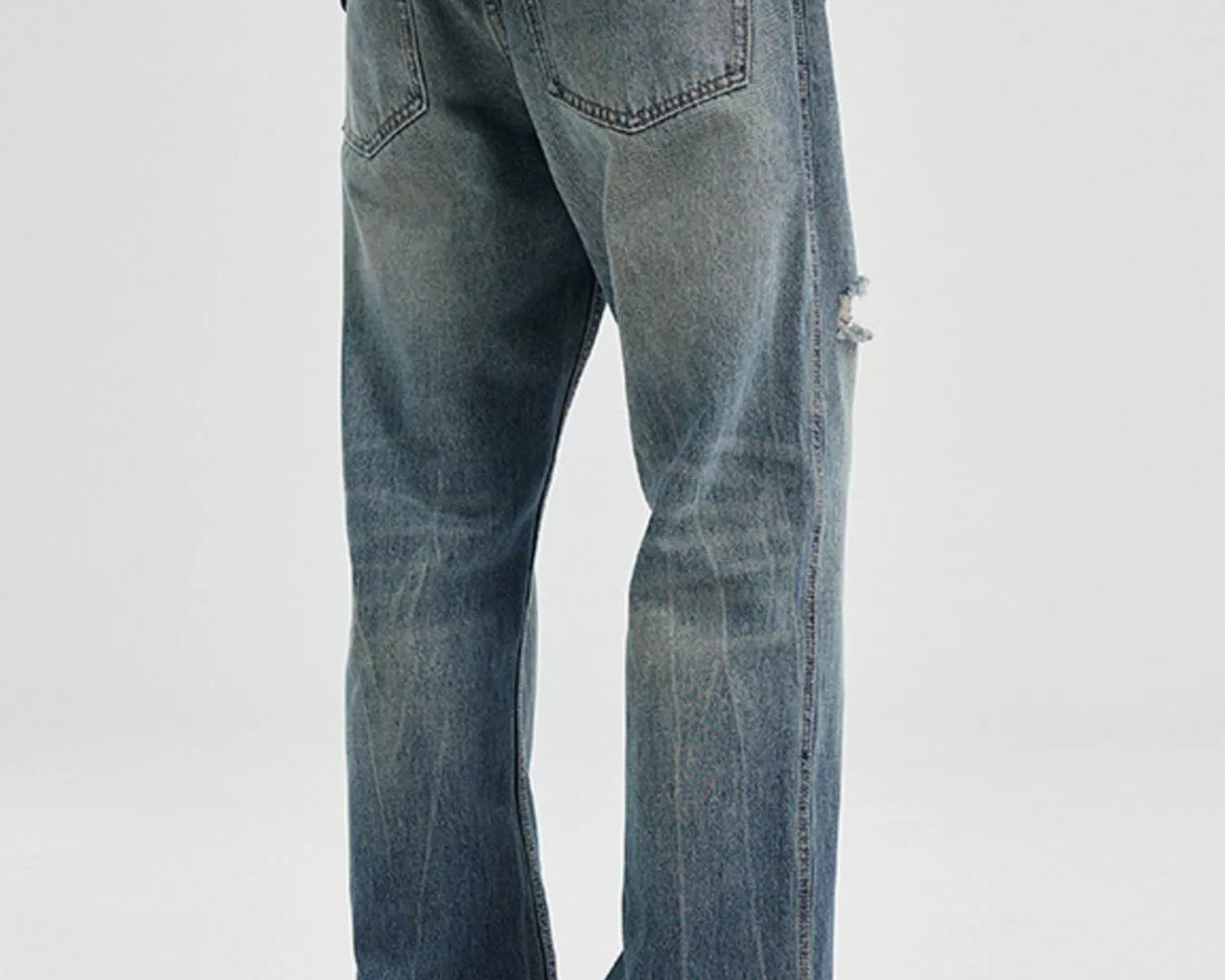 NEWYORKLISTED ATLAS MEN's COLLECTION: Person wearing blue jeans and a checkered shirt on a white background