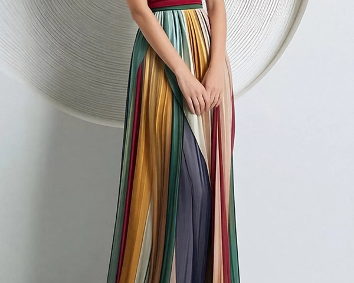NEWYORKLISTED STYLE COLLECTION: Multicolored strapless gown on a white background