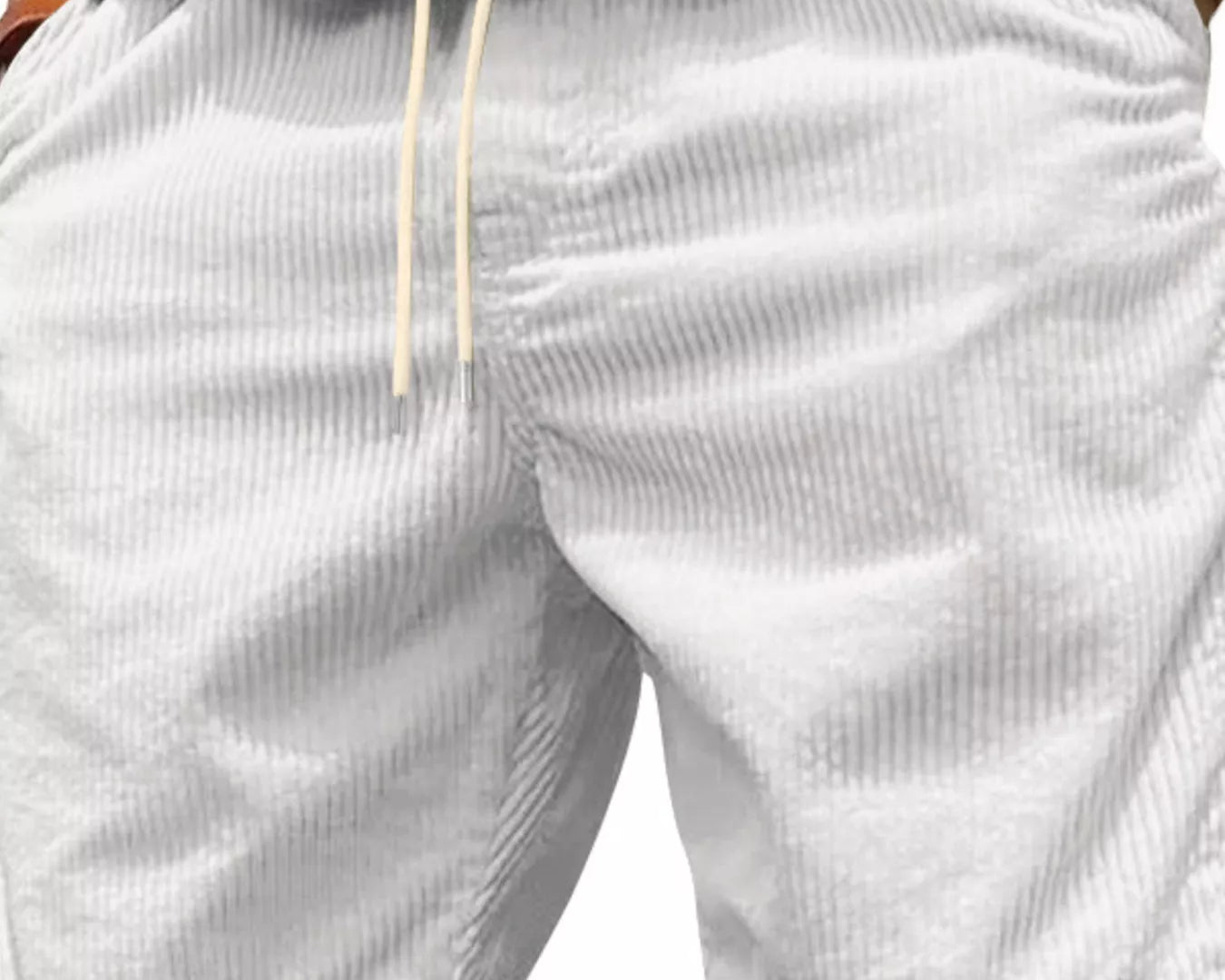 NEWYORKLISTED ATLAS MEN'S COLLECTION: White shorts worn by a person on a white background