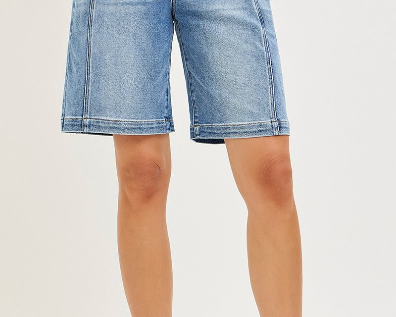 NEWYORKLISTED STYLE COLLECTION: Blue denim shorts worn by a person on a white background