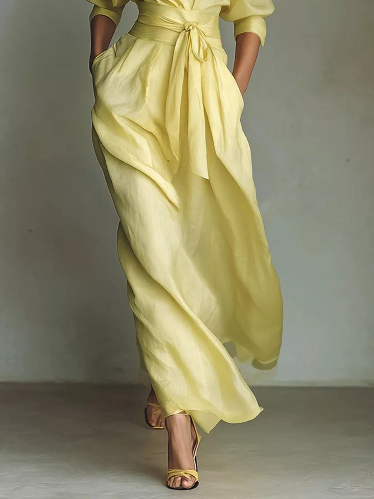 NEWYORKLISTED STYLE COLLECTION: Yellow dress with a plain background