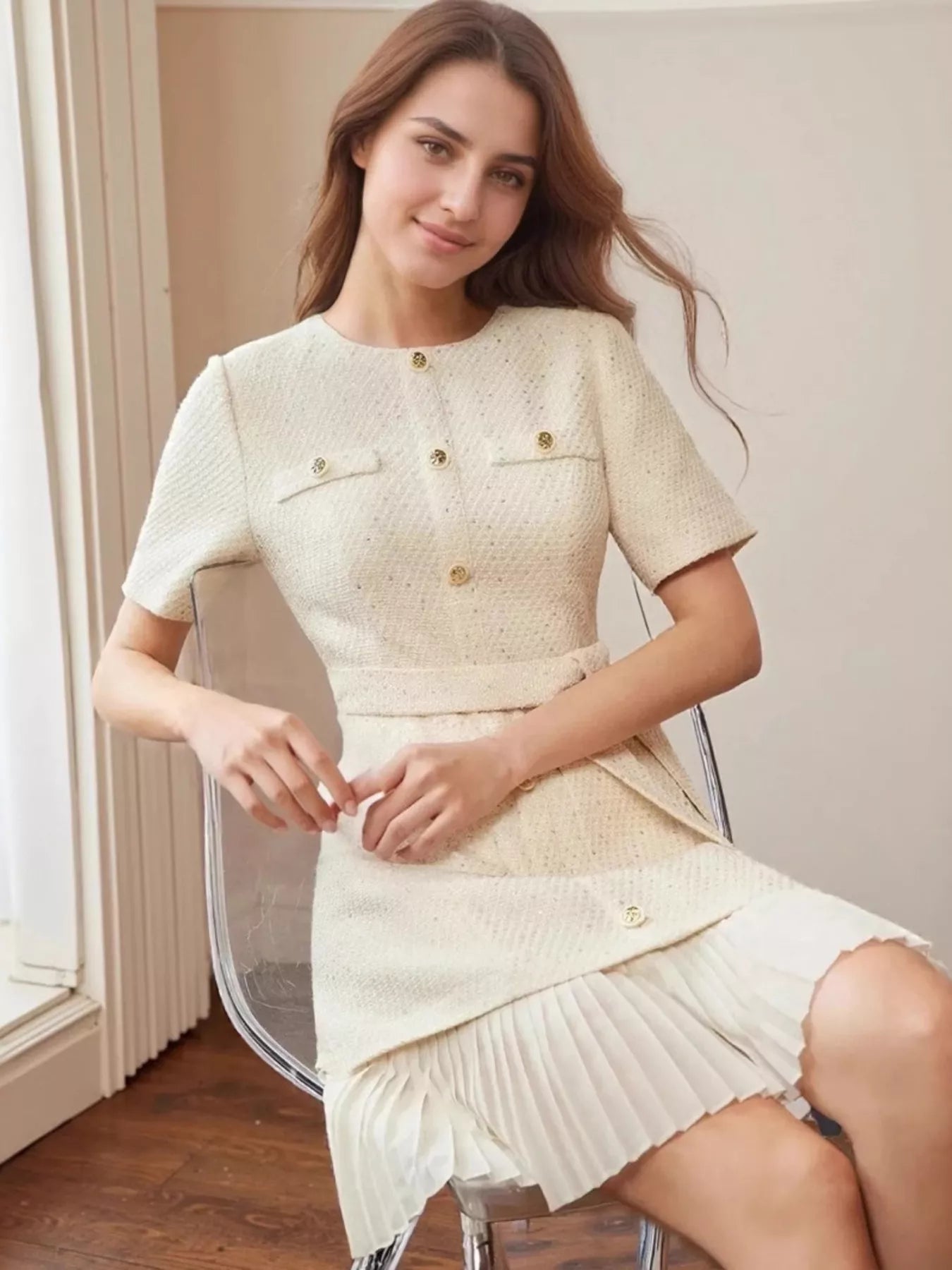 NEWYORKLISTED STYLE COLLECTION Pleated Hem Round Neck Dress – belted cream dress with gold buttons and pleated hem
