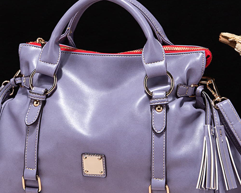 NEWYORKLISTED STYLE COLLECTION: Vegan Leather Handbag with Tassels - NEWYORKLISTED