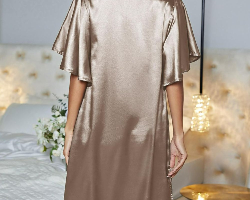 NEWYORKLISTED Intimate Apparel: Woman wearing a satin nightgown in a bedroom setting