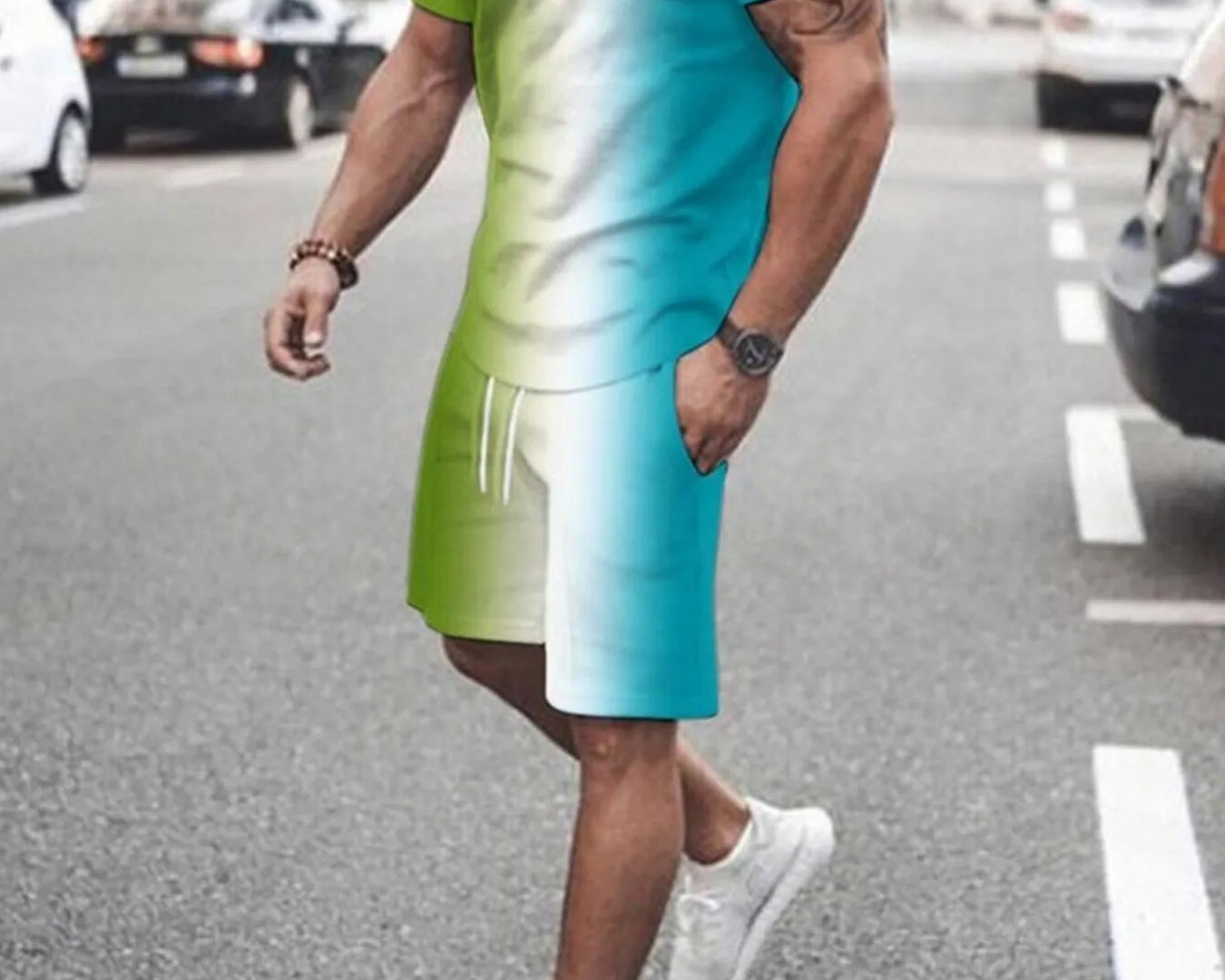 NEWYORKLISTED ATLAS MEN's COLLECTION: Person wearing a green and blue gradient dress on a city street.
