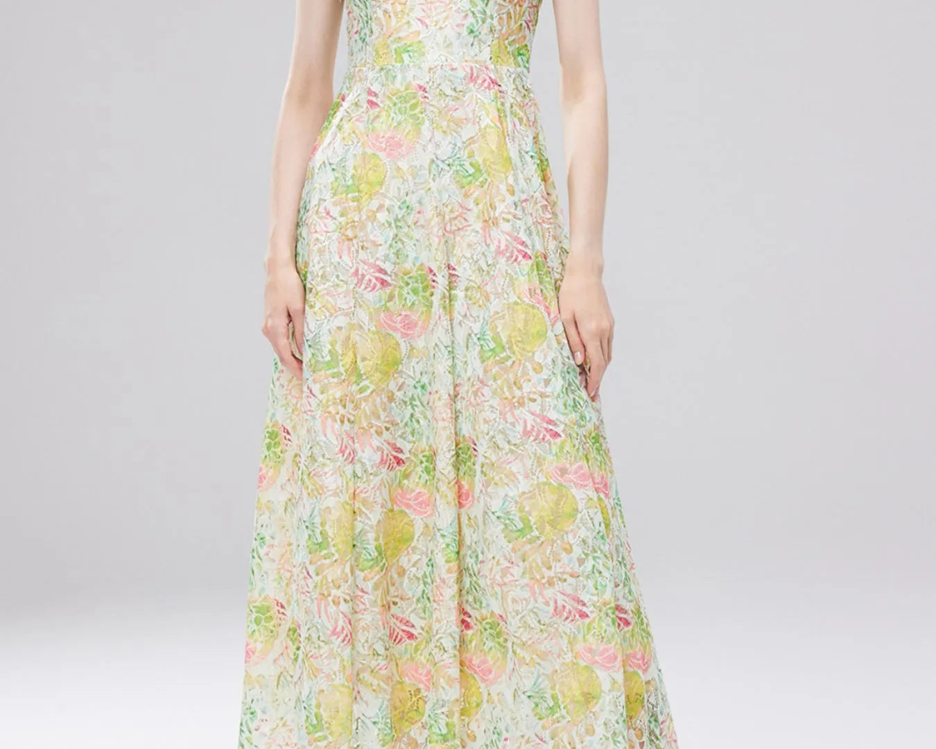 NEWYORKLISTED STYLE COLLECTION: Woman wearing a floral dress on a white background