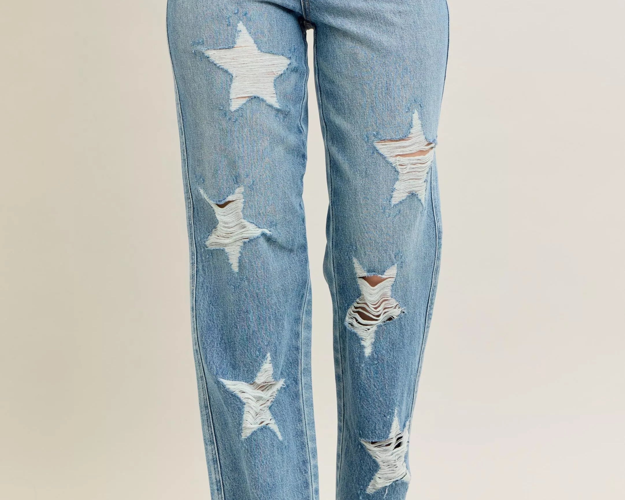 NEWYORKLISTED STYLE COLLECTION: Blue jeans with star patterns on a beige background
