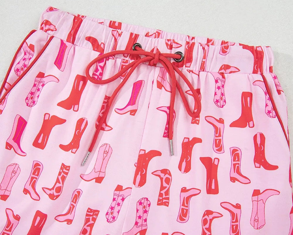 NEWYORKLISTED Intimate Apparel: Skirt with red boot pattern on a light pink background