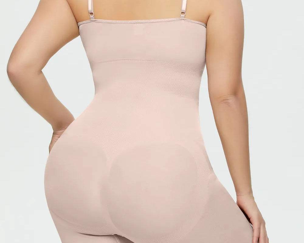 NEWYORKLISTED Intimate Apparel Collection: Person wearing a beige shapewear garment on a plain background