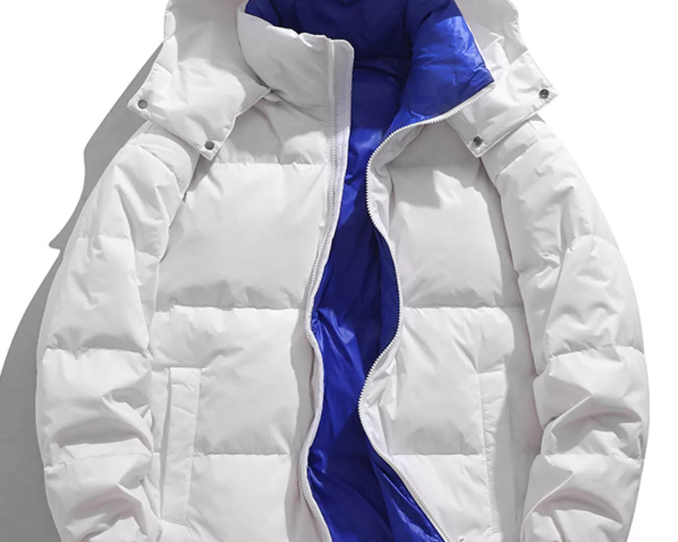 NEWYORKLISTED ATLAS MEN’S COLLECTION: White puffer jacket with blue lining on a white background
