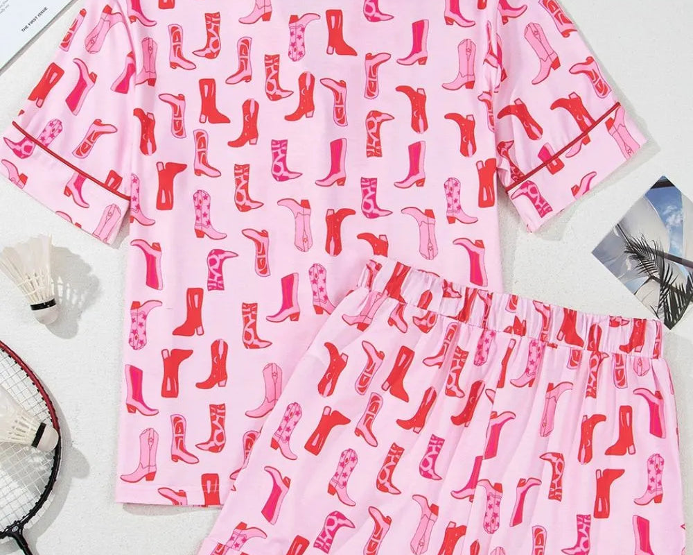 NEWYORKLISTED Intimate Apparel: Pink pajama set with red sock pattern on a white surface