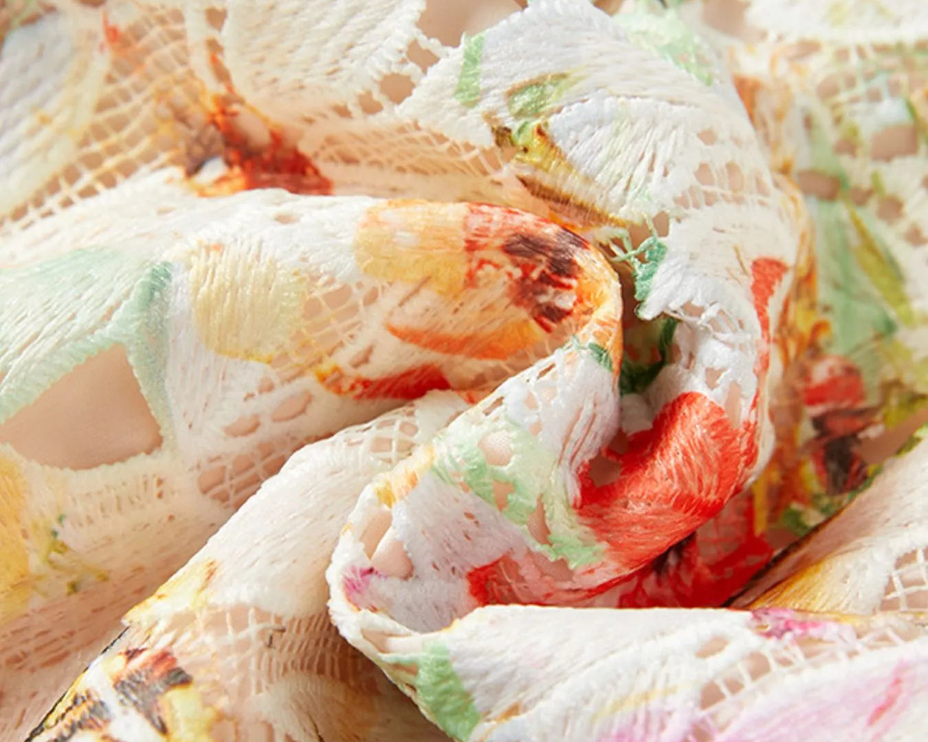 NEWYORKLISTED STYLE COLLECTION: Close-up of colorful fabric with floral patterns