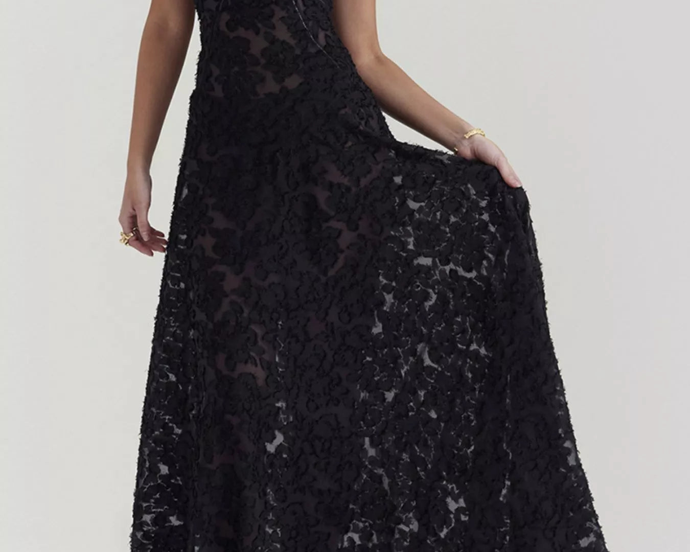 NEWYORKLISTED STYLE COLLECTION: Black lace dress on a white background