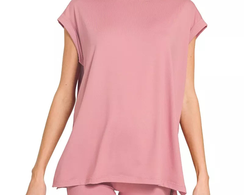 NEWYORKLISTED Comfort Collection: Woman wearing a light rose outfit on a white background