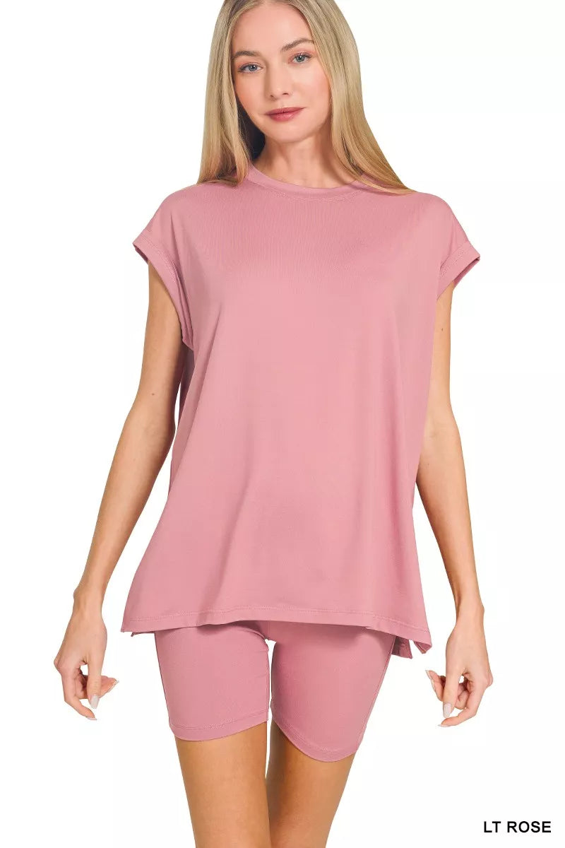 NEWYORKLISTED Comfort Collection: Woman wearing a light rose outfit on a white background