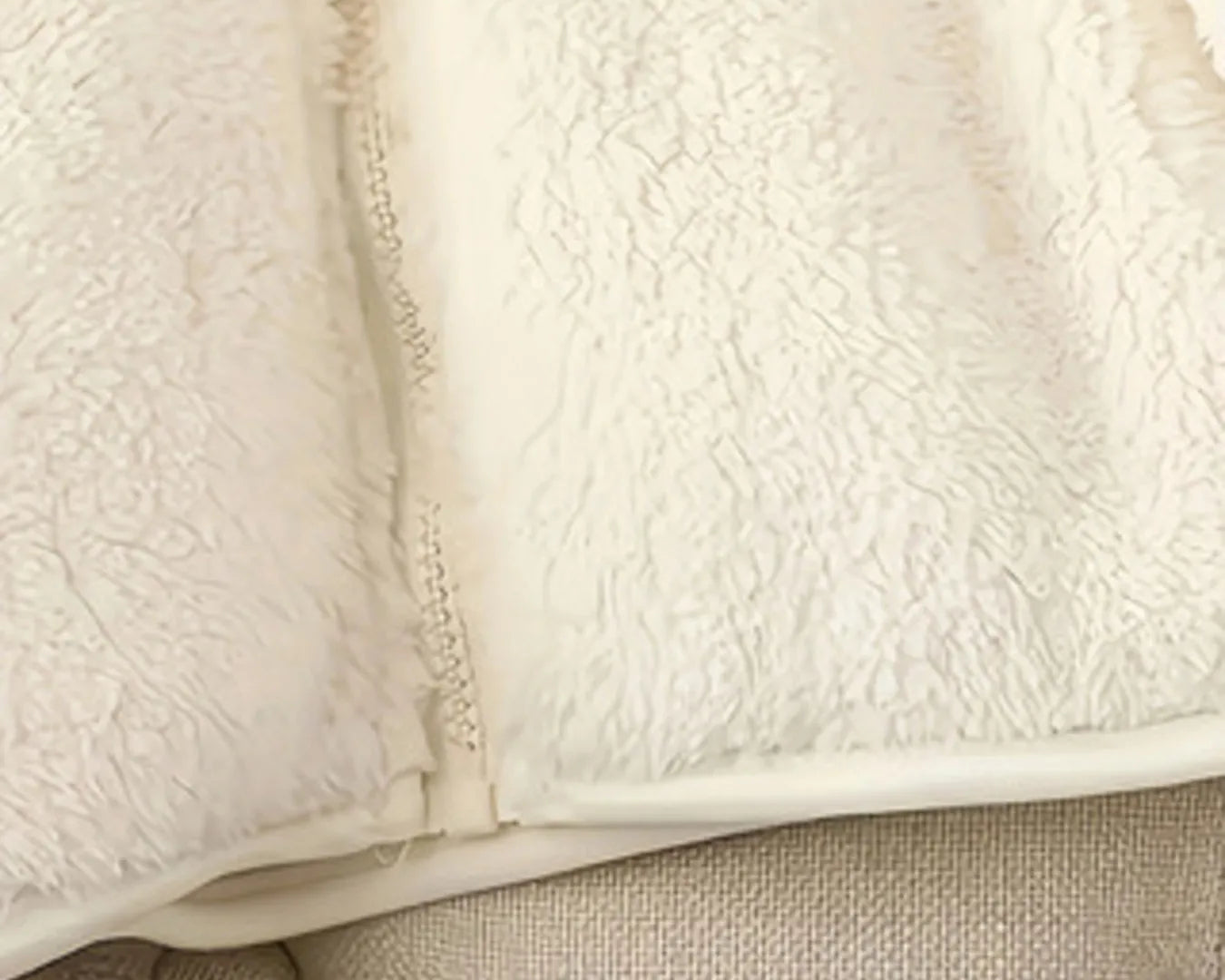 Close-up of a textured fabric surface with a focus on texture and color.