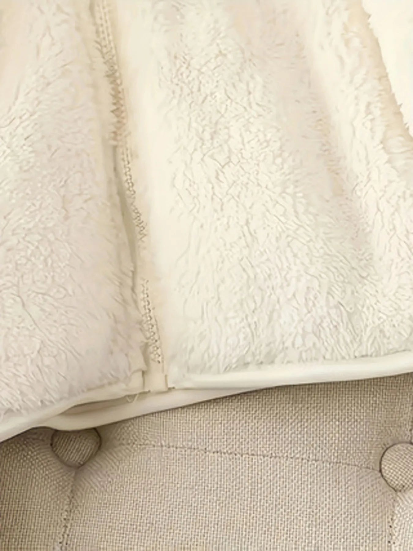 Close-up of a textured fabric surface with a focus on texture and color.