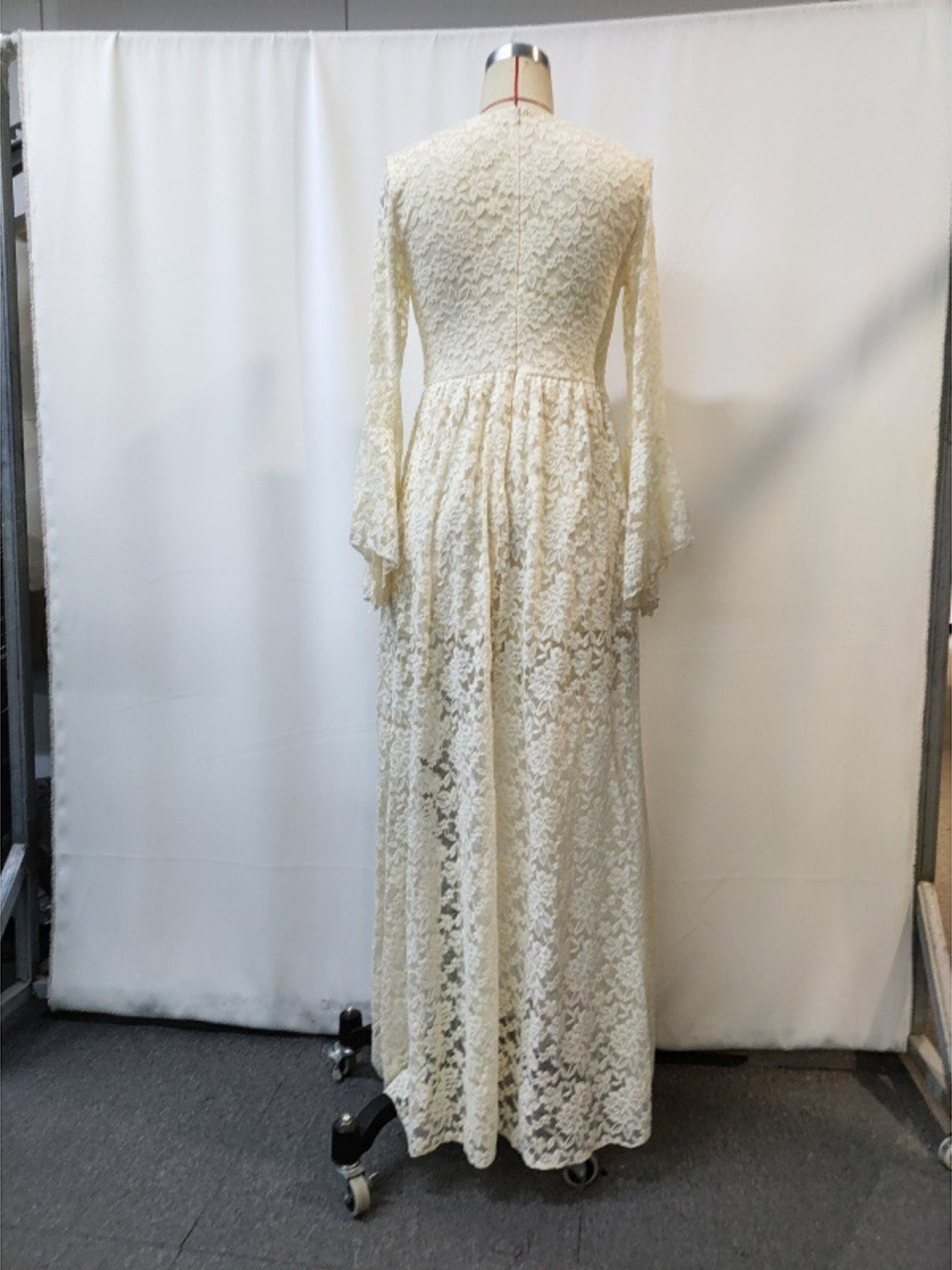 NEWYORKLISTED STYLE COLLECTION: Lace dress on a mannequin against a white backdrop