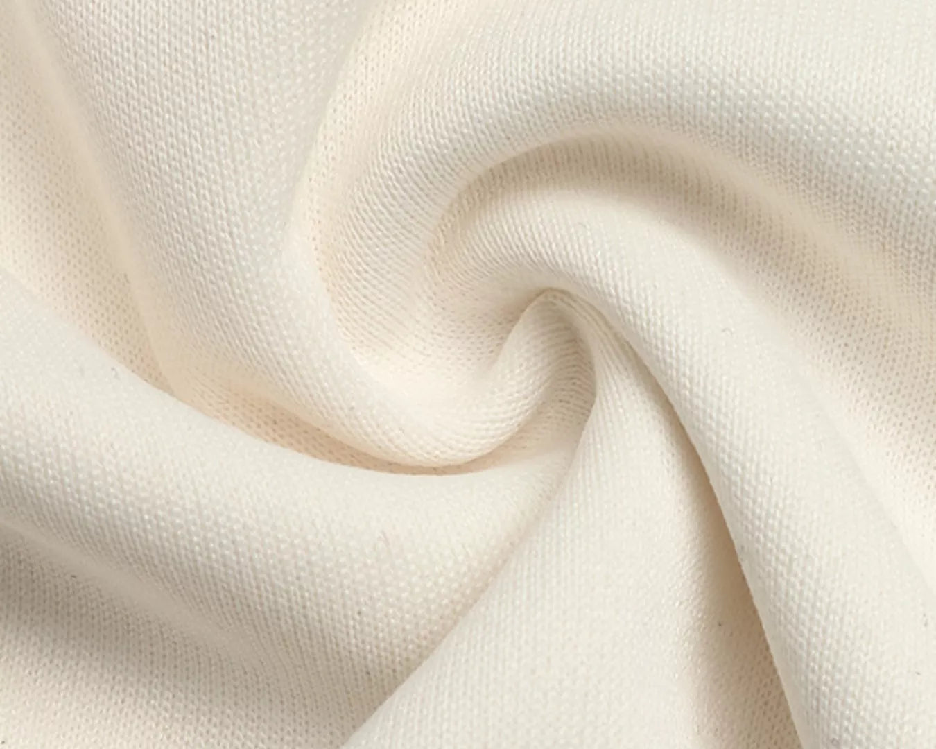 NEWYORKLISTED STYLE COLLECTION: Close-up of white fabric with a soft texture