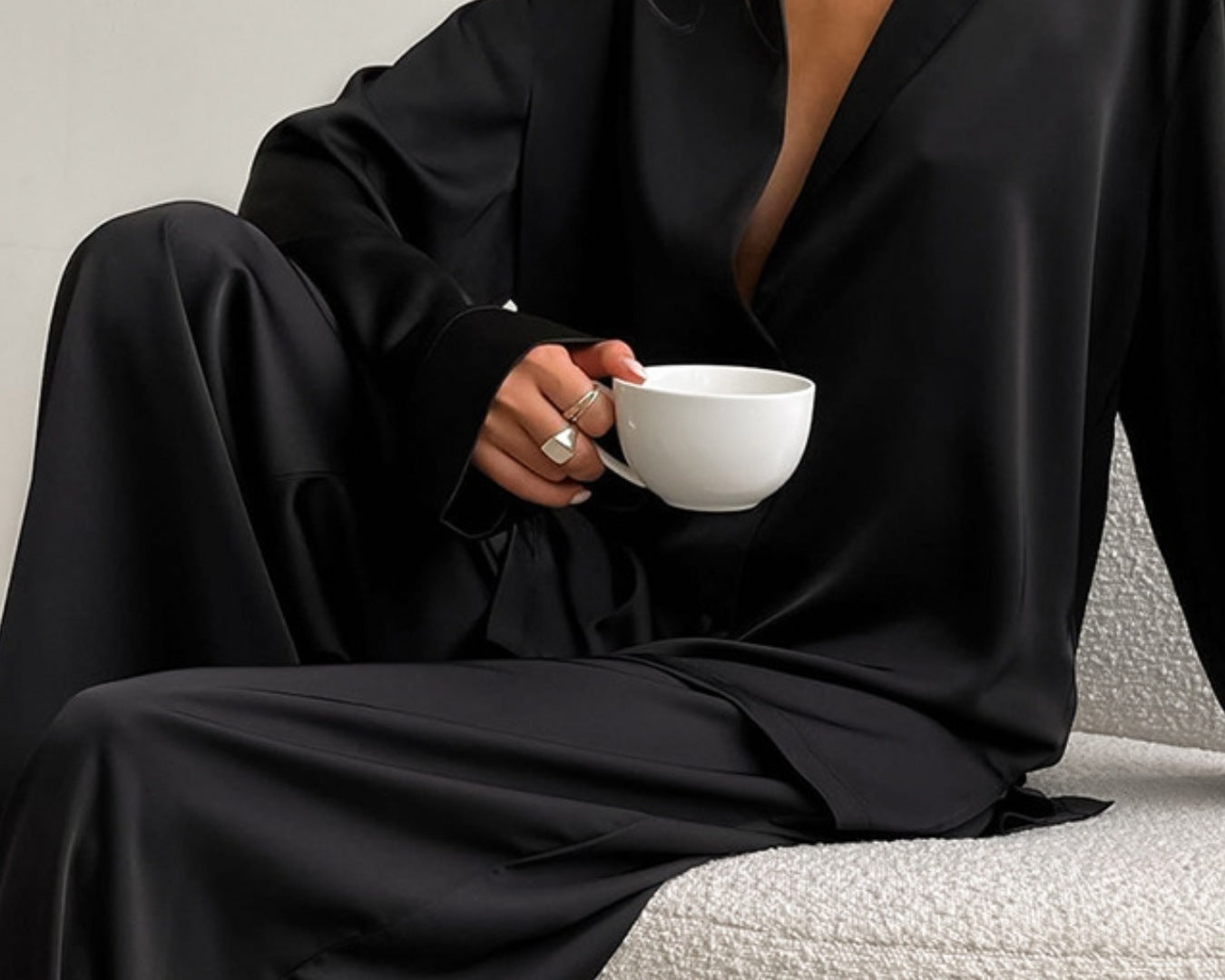 NEWYORKLISTED Intimate Apparel Collection: model wearing black lounge wear set