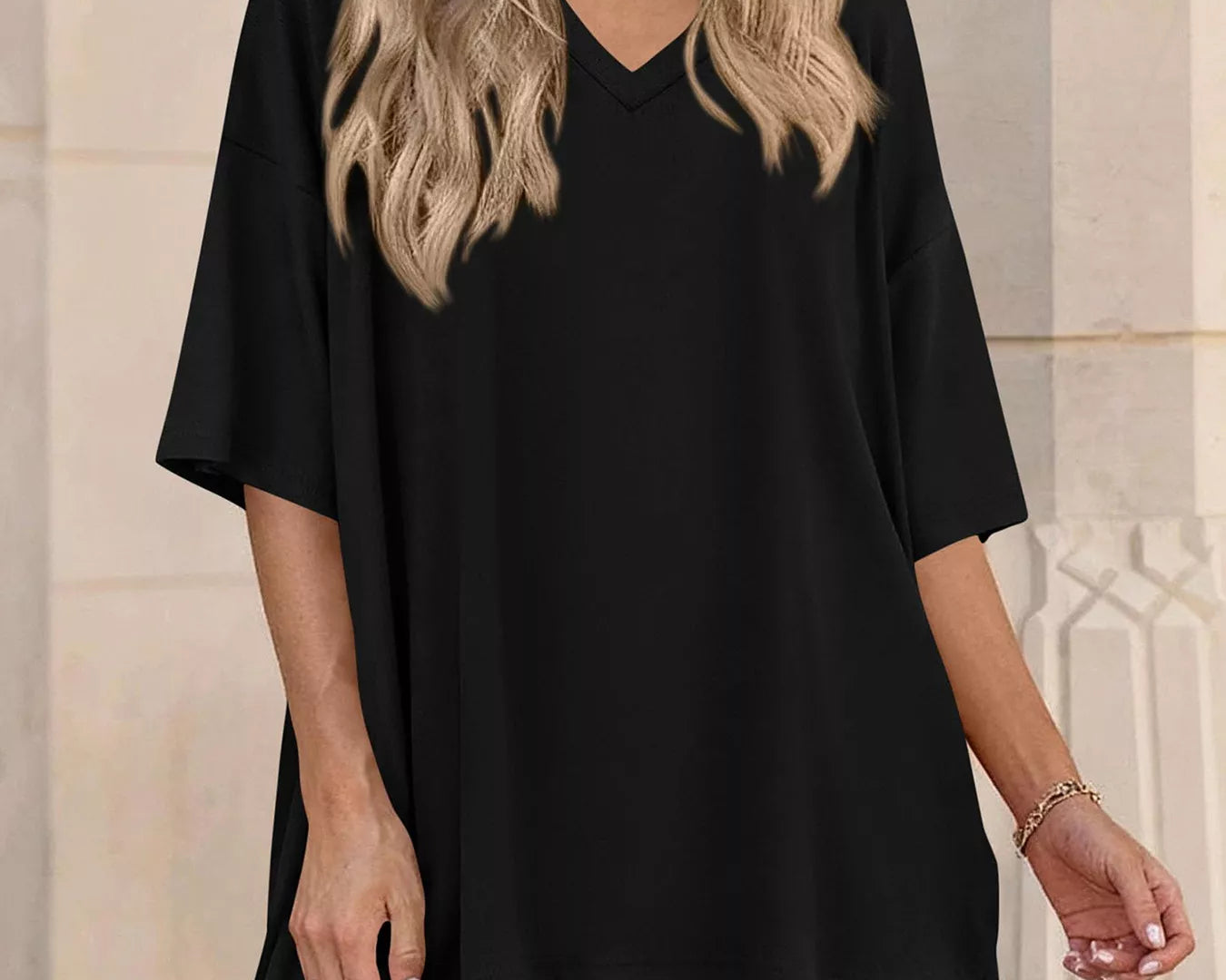 NEWYORKLISTED COMFORT COLLECTION: Woman wearing a black outfit with a neutral background