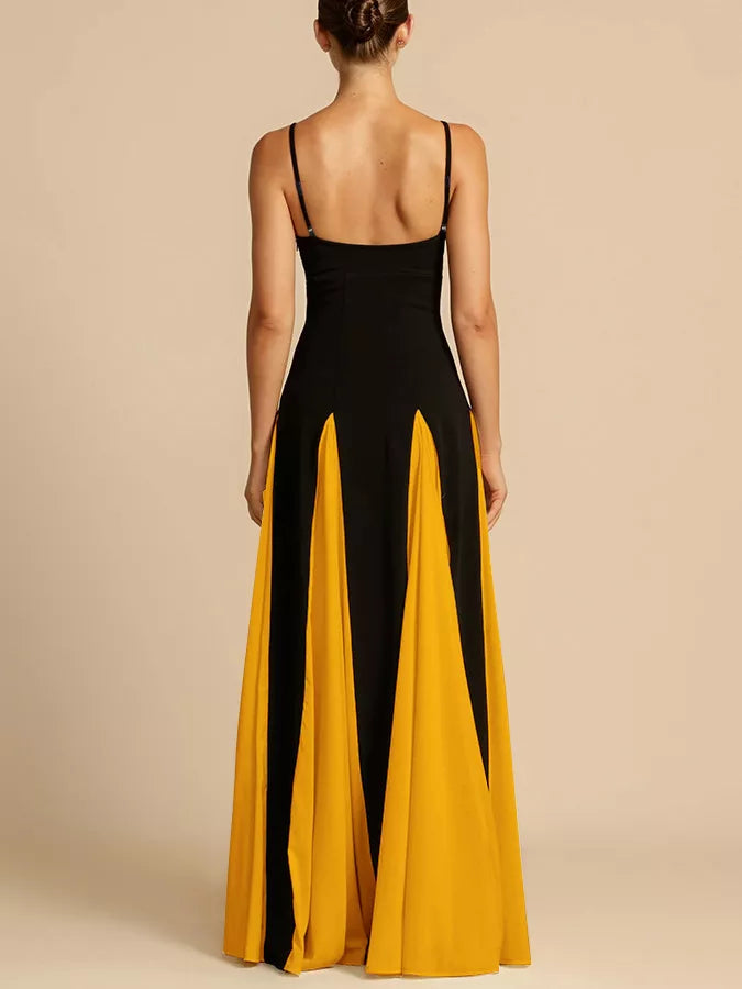 NEWYORKLISTED STYLE COLLECTION: Woman wearing a black and yellow dress with a beige background