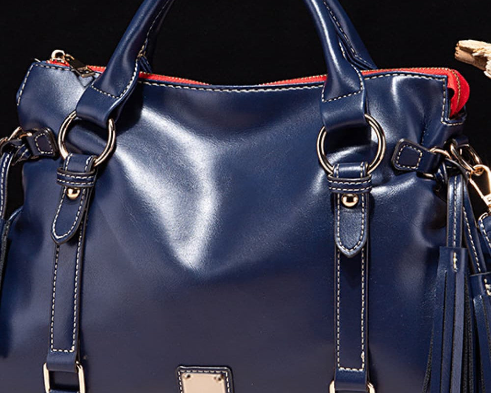 NEWYORKLISTED STYLE COLLECTION: Vegan Leather Handbag with Tassels - NEWYORKLISTED