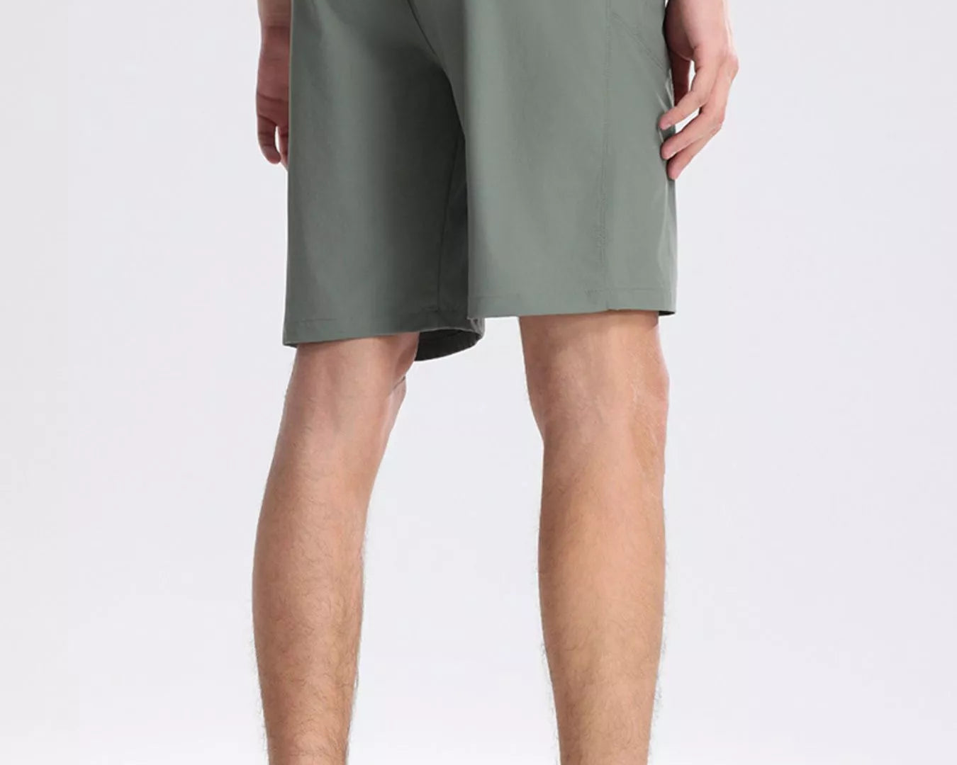 NEWYORKLISTED ATLAS MEN's COLLECTION: Person wearing green shorts on a white background