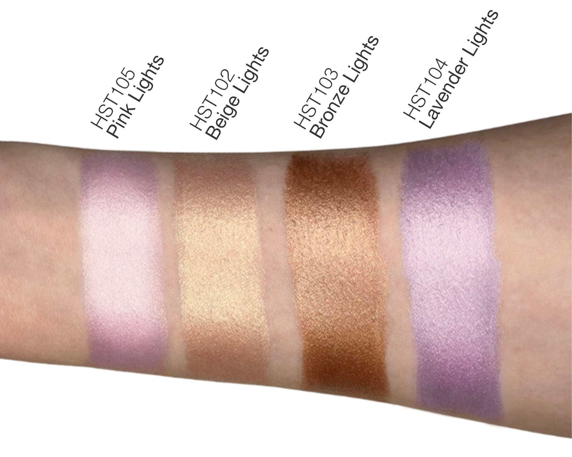 NEWYORKLISTED Cosmetic Collection: Color swatches on a arm with labels for HST103 Pink Lights, HST102 Beige Lights, HST103 Bronze Lights, and HST104 Lavender Lights.