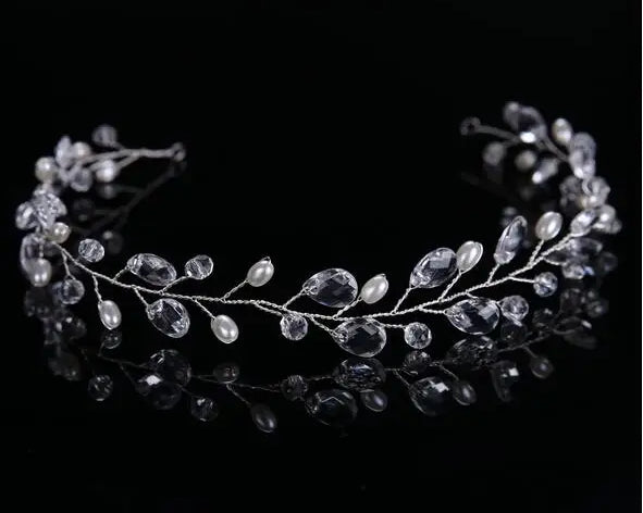 Silver hair vine with beads on a black background