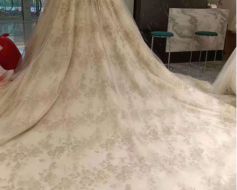 Floral patterned fabric draped over a surface with a blurred indoor background