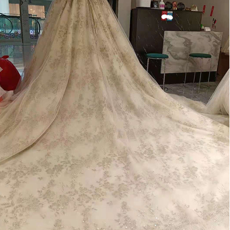 Floral patterned fabric draped over a surface with a blurred indoor background