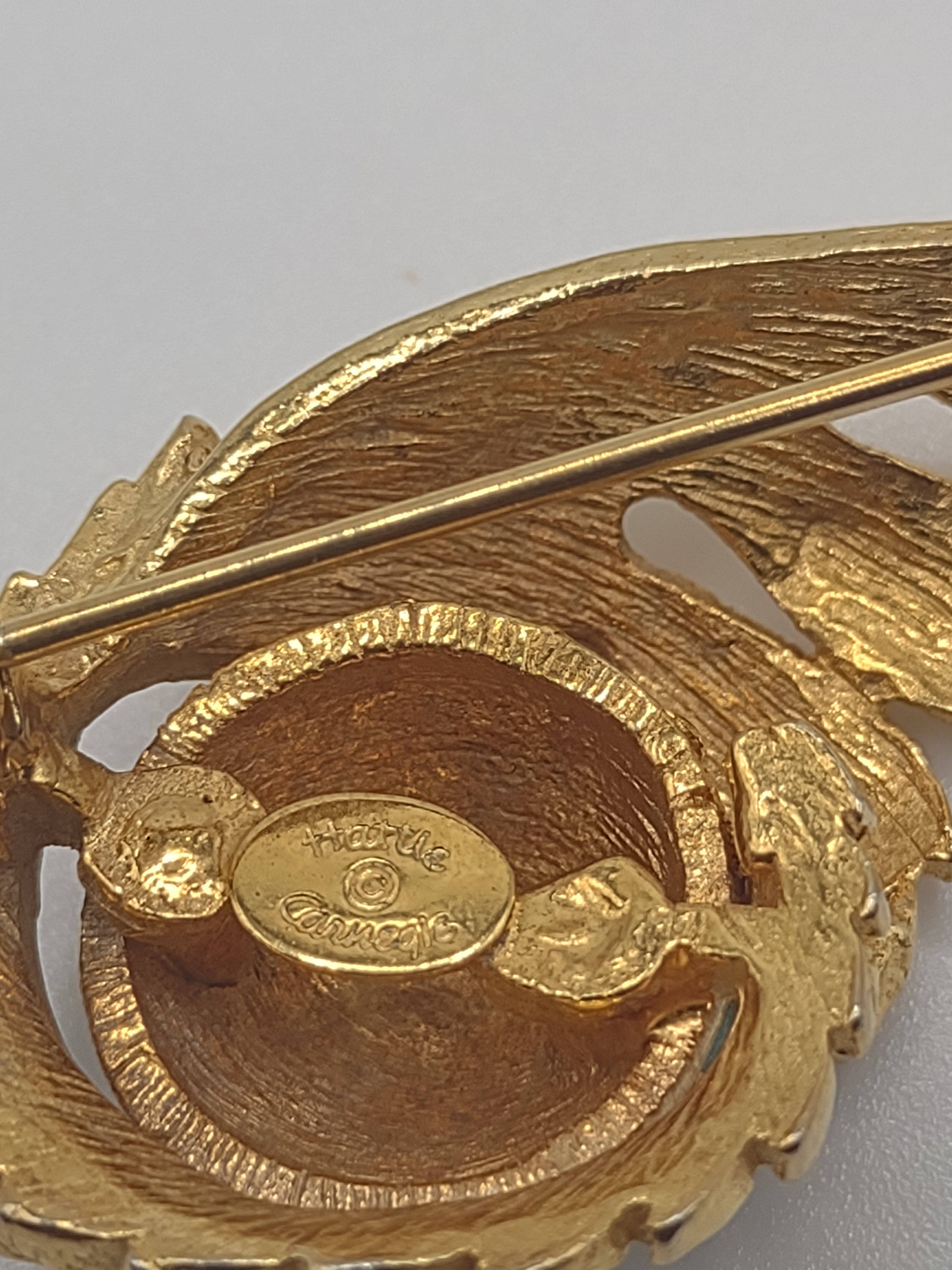 Elegant Hattie Carnegie Gold Tone Swirl Brooch with Simulated Turquoise Stones - NEWYORKLISTED